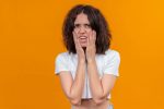 knocked-out tooth steps to take before seeing a dentist