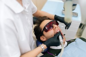 what is laser gum treatment and is it better than traditional gum surgery near red deer